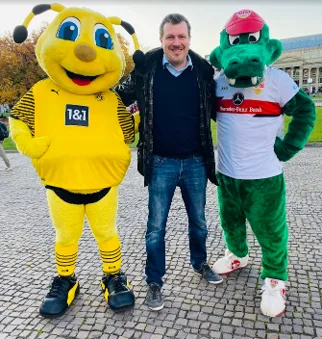 Soccer and mascot fan